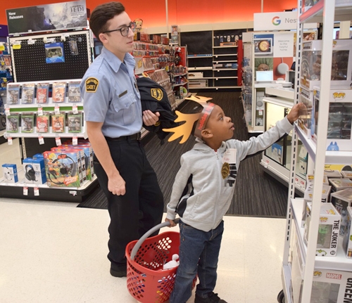 cadet officer with child